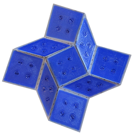 an origami composite prototype. a flat material has been folded to produce a 3d shape that looks similar to a 4-pointed star.